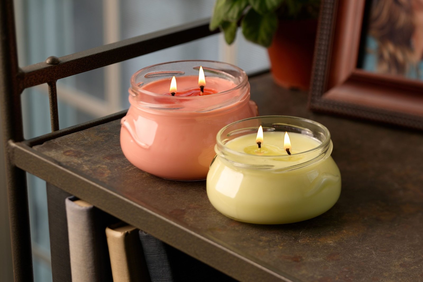 Elegant home decor candles in various shapes and sizes, adding a warm and inviting ambiance to the living room