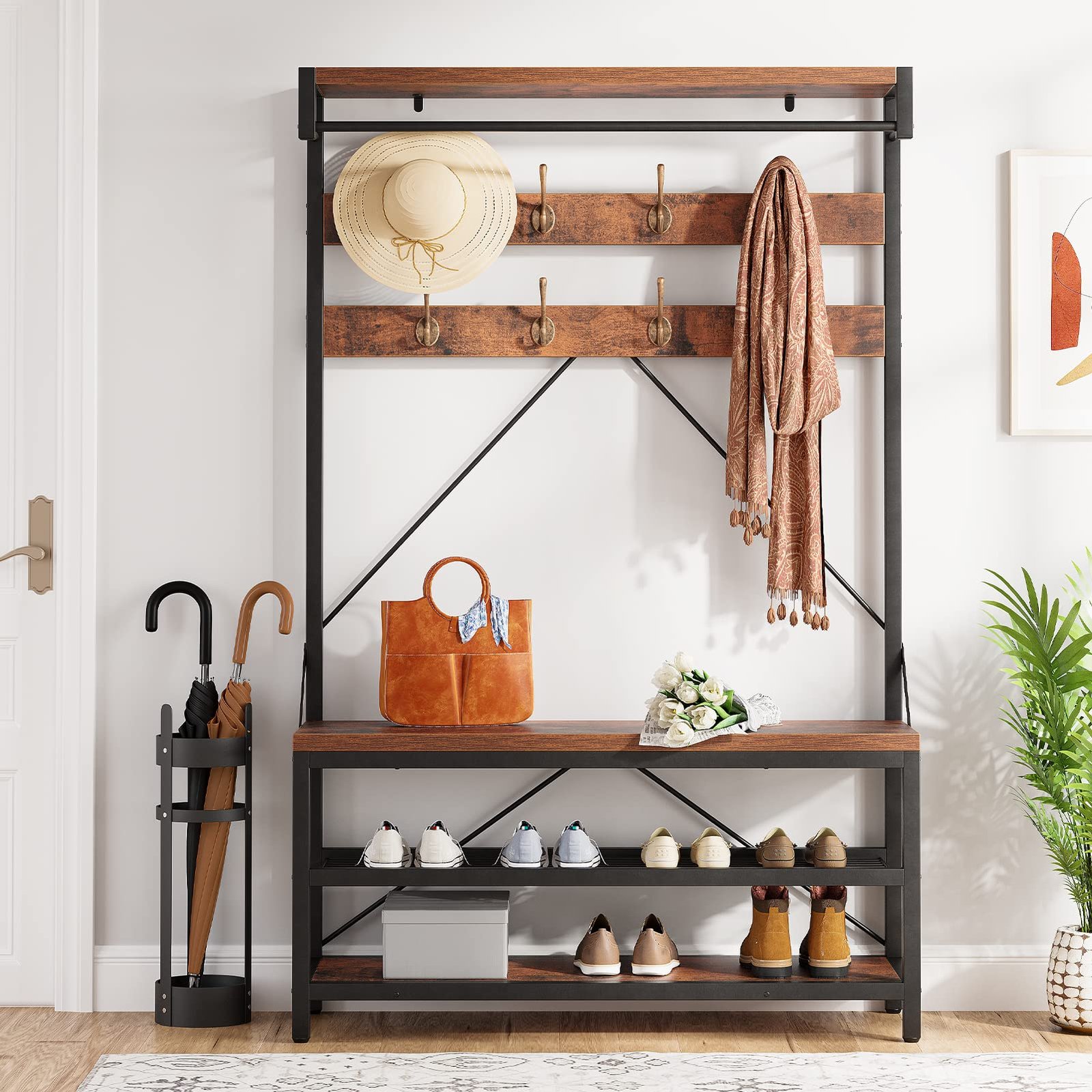 Modern hallway with a multipurpose coat rack featuring hooks, shelves, and built-in seating, exemplifying 2024 furniture trends